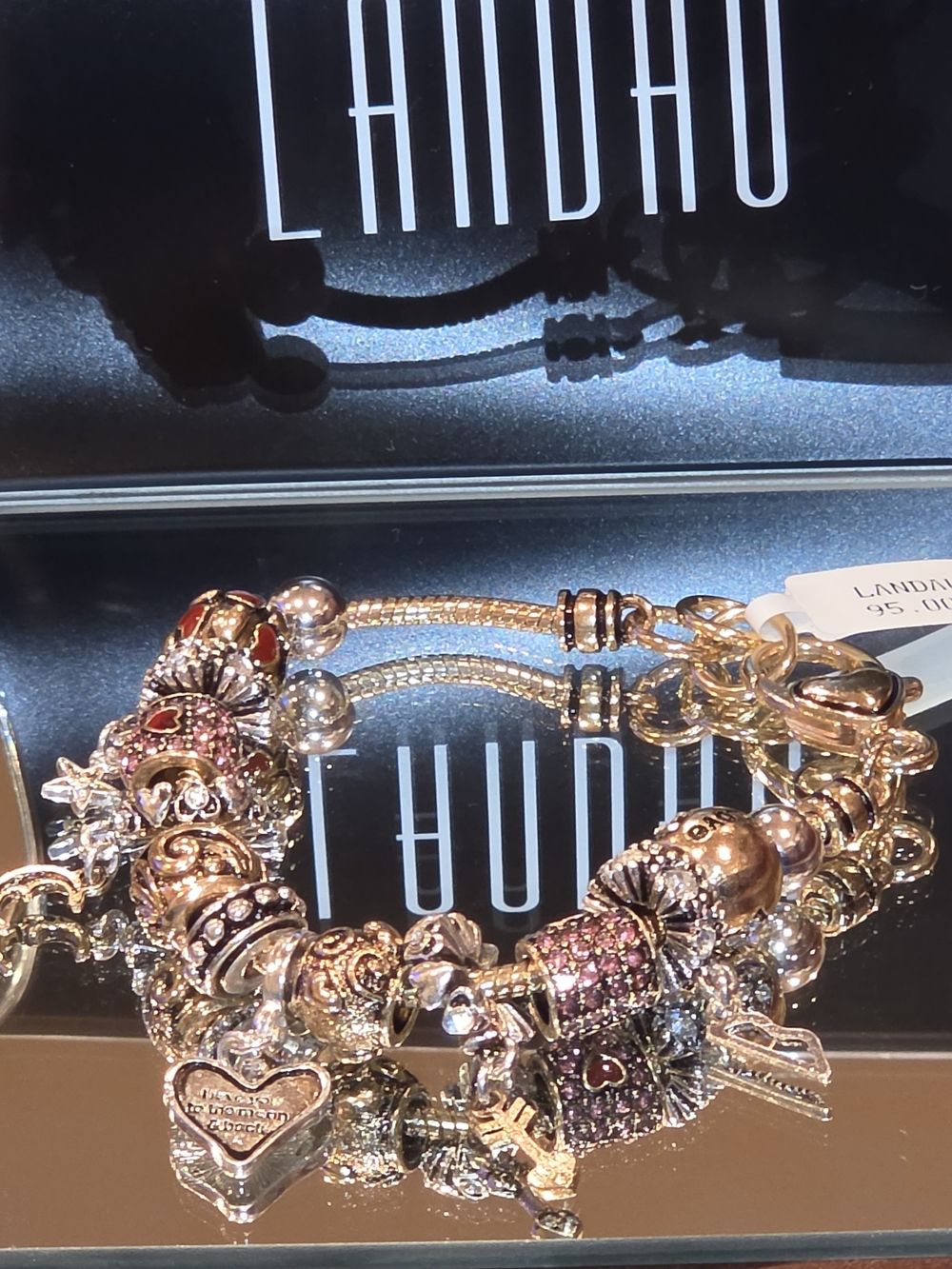 Landau Gold-Tone Charm Bracelet with Pink Accents